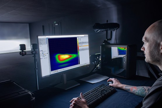 man sitting in front of computer